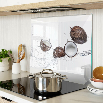 Glass kitchen board Coconuts in water