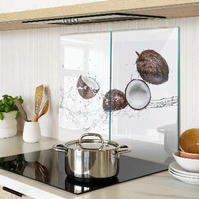 Glass kitchen board Coconuts in water