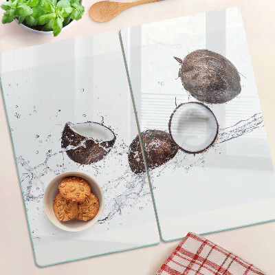 Glass kitchen board Coconuts in water