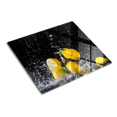 Glass kitchen board Lemons in water