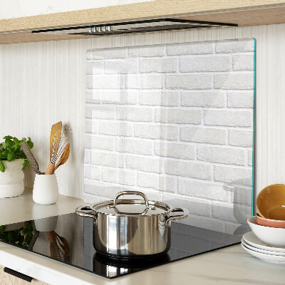 Glass chopping board Brick wall