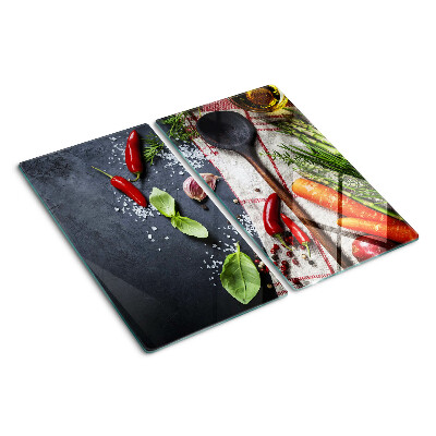 Glass chopping board Kitchen spices and vegetables