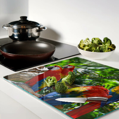 Glass kitchen board Parrots in a tropical setting