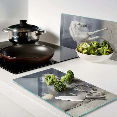 Glass chopping board White horses on the run