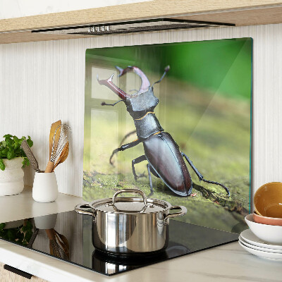 Glass chopping board Stag beetle on a green background