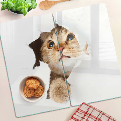 Glass kitchen board A cat looking through a hole in the wall