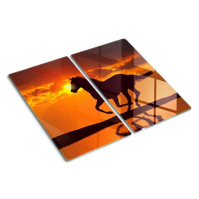 Glass chopping board A horse against the backdrop of the setting sun