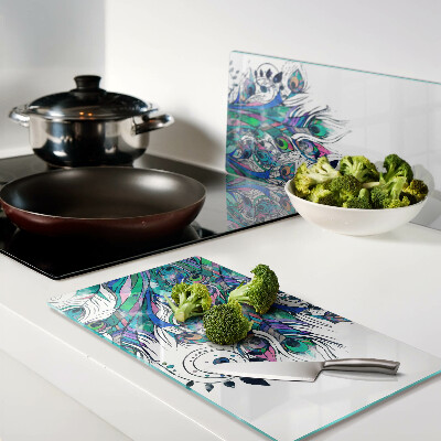 Glass chopping board Peacock feathers in green and blue colors
