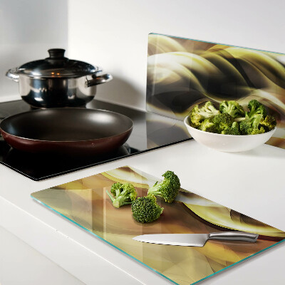 Glass kitchen board Abstract waves in shades of gold