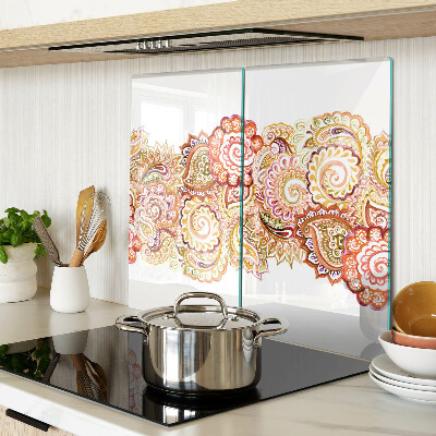 Glass chopping board Paisley motif in shades of red and gold