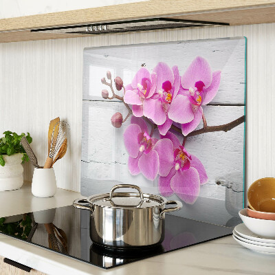 Glass chopping board Orchids on a white background