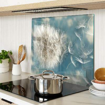 Glass kitchen board Dandelions against the sky