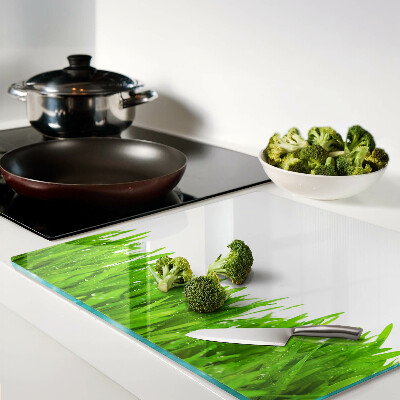 Glass chopping board Green grass with water drops