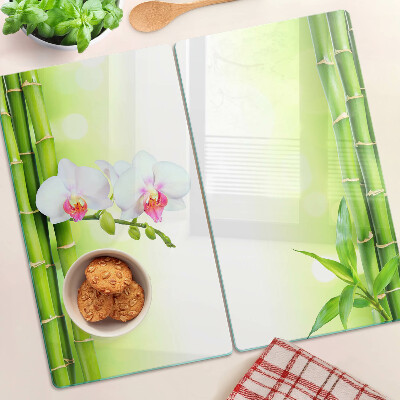 Glass kitchen board Orchids and bamboo