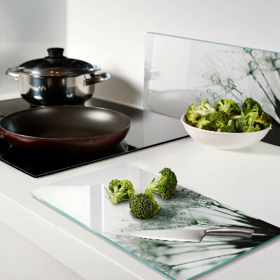 Glass kitchen board Dandelions with water drops