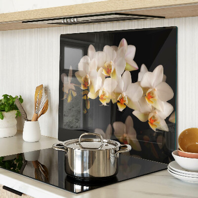 Glass chopping board Orchids on a black background