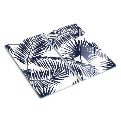 Glass chopping board Palm leaves on a white background