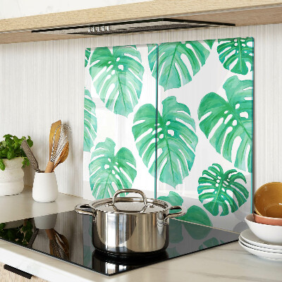 Glass kitchen board Monstera leaves on a white background
