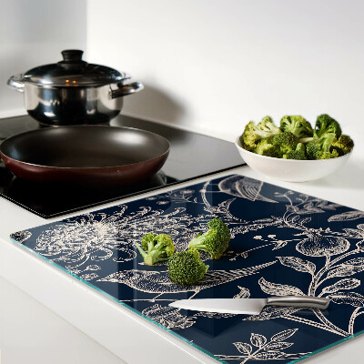 Glass chopping board Flowers and birds on a dark background
