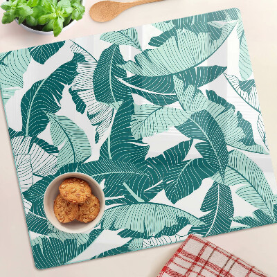 Glass kitchen board Tropical leaves in shades of green