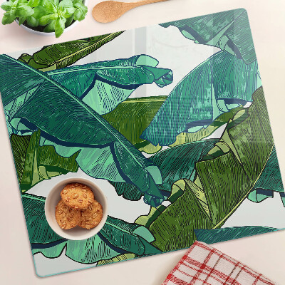 Glass kitchen board Palm leaves in shades of green