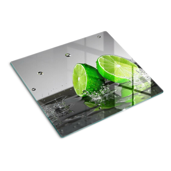 Glass kitchen board Lemons in water