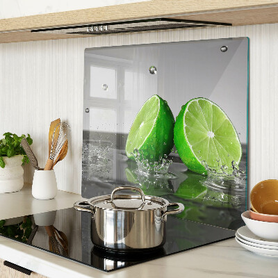 Glass kitchen board Lemons in water
