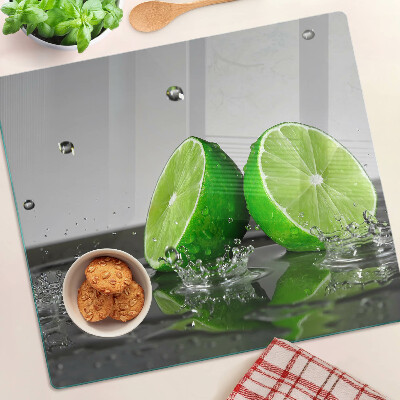 Glass kitchen board Lemons in water