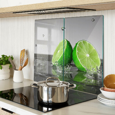 Glass kitchen board Lemons in water