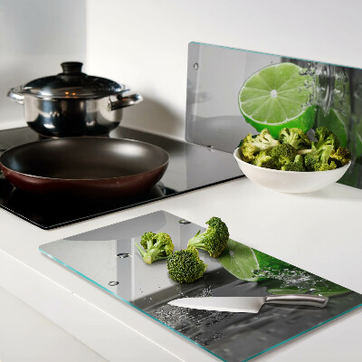 Glass kitchen board Lemons in water