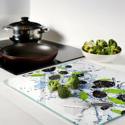 Glass chopping board Fruit in water