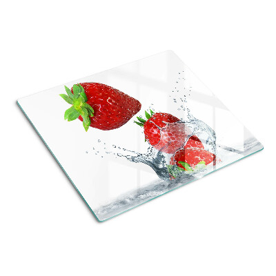 Glass chopping board Strawberries in water