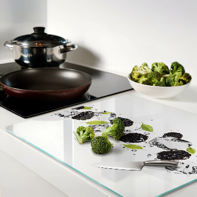 Glass kitchen board Raspberries with leaves and water drops