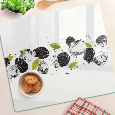 Glass kitchen board Raspberries with leaves and water drops