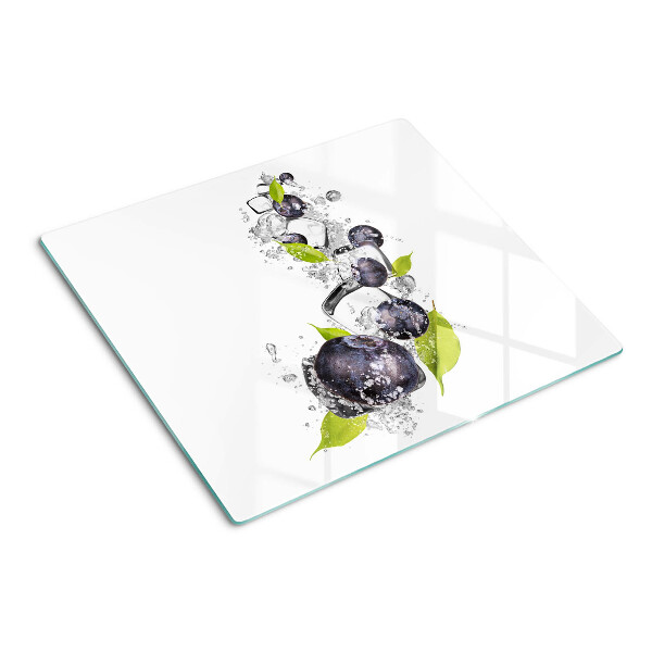 Glass kitchen board Plums in water with leaves