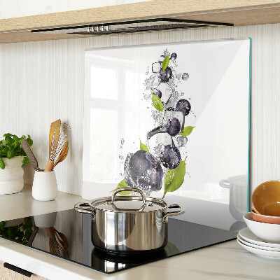 Glass kitchen board Plums in water with leaves