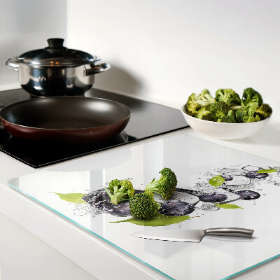 Glass kitchen board Plums in water with leaves