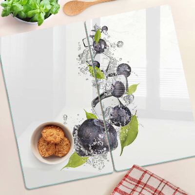 Glass kitchen board Plums in water with leaves