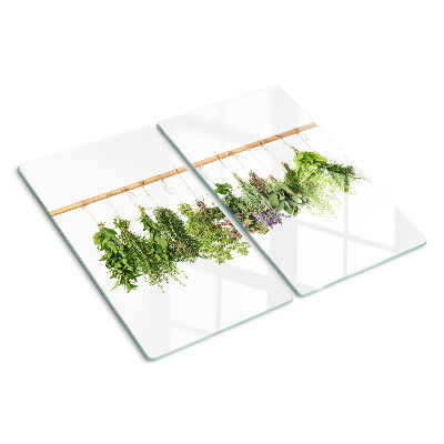 Glass chopping board Dried herbs on a string