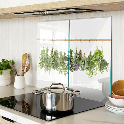 Glass chopping board Dried herbs on a string