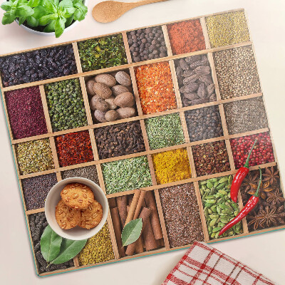 Glass kitchen board Spices in jars