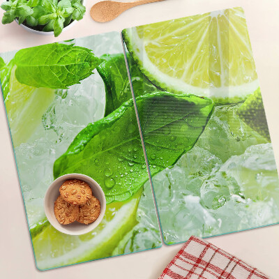 Glass chopping board Lemons and mint leaves