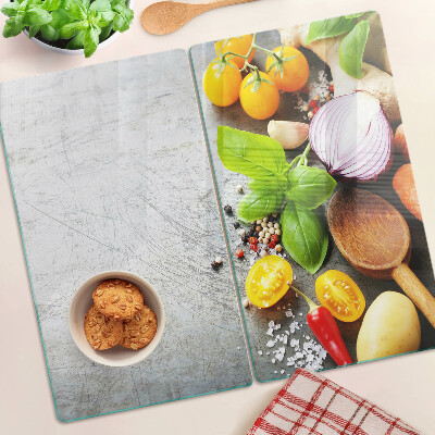 Glass chopping board Kitchen ingredients and herbs