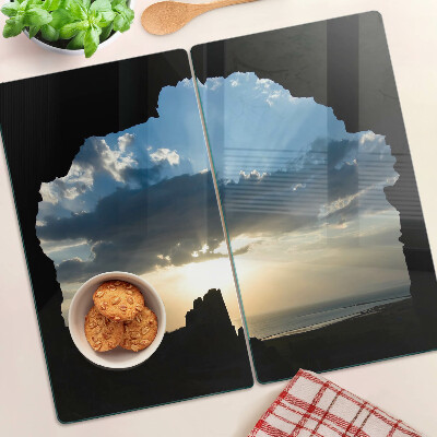 Glass kitchen board Sunset behind the clouds