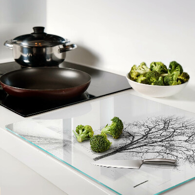 Glass kitchen board Empty winter landscape with a tree