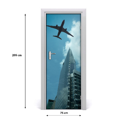 Self-adhesive door wallpaper Plane over the city