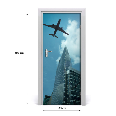 Self-adhesive door wallpaper Plane over the city