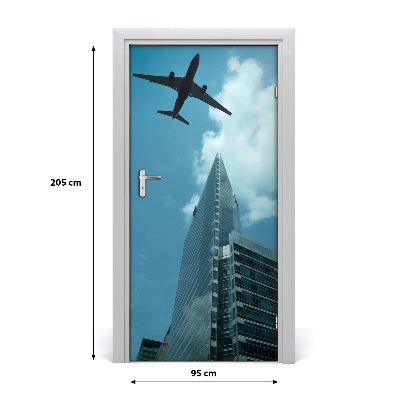 Self-adhesive door wallpaper Plane over the city