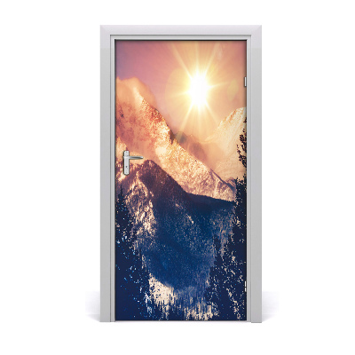 Door wallpaper Sun over the mountains