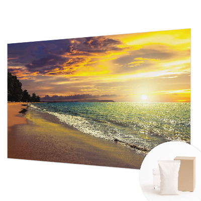 Wall mural depicting a beach at sunset